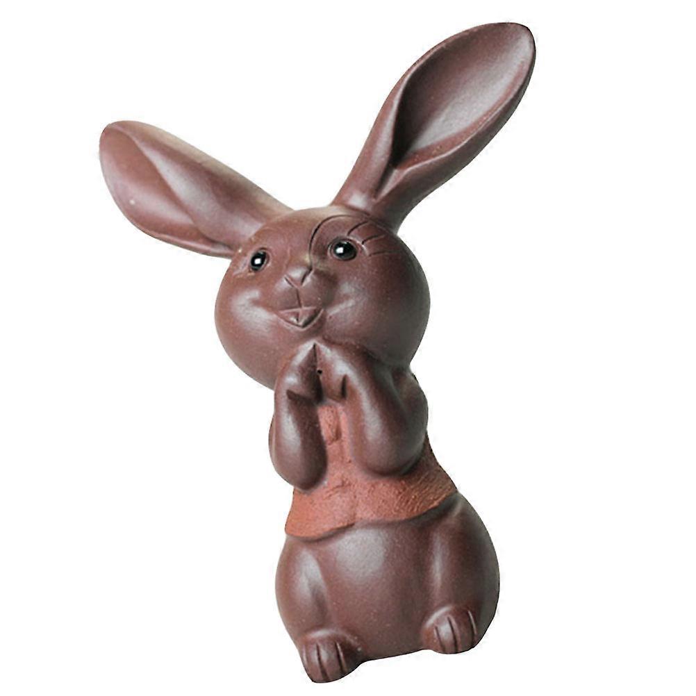 Here's a refined and engaging product description based on the title you provided:
**Creative Rabbit Shaped Tea Pet Adornment – Red Stoneware Tea