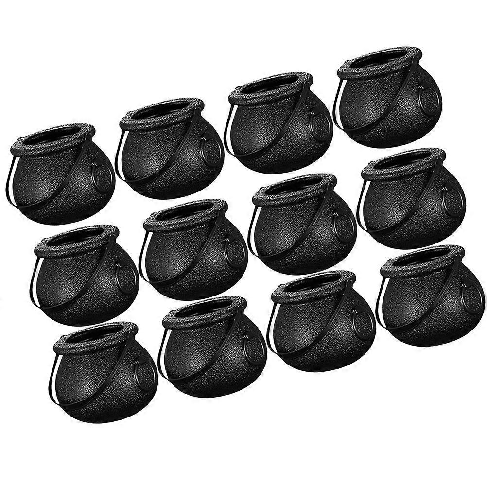 It looks like you've provided a product title or listing for Halloween themed candy cauldron buckets. Here's a more organized and clear description