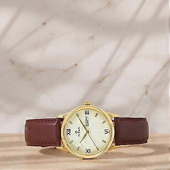 Titan Champagne Dial Analog with Day and Date Leather Strap watch for Men nt1580yl05