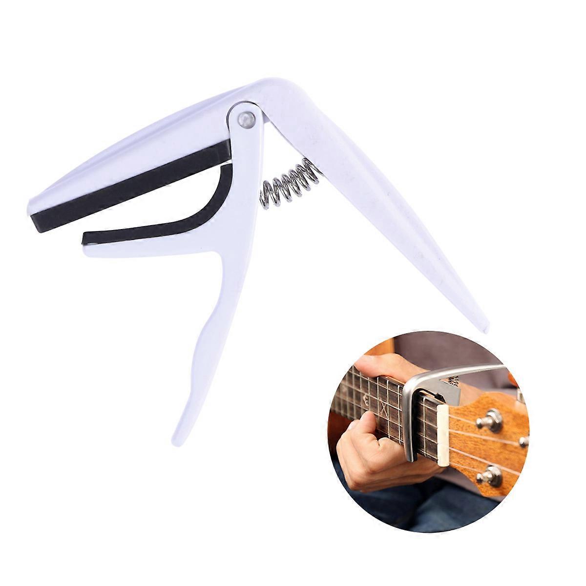 Ukulele Device, Multi-Instrument Capo with Protective Features, Performance