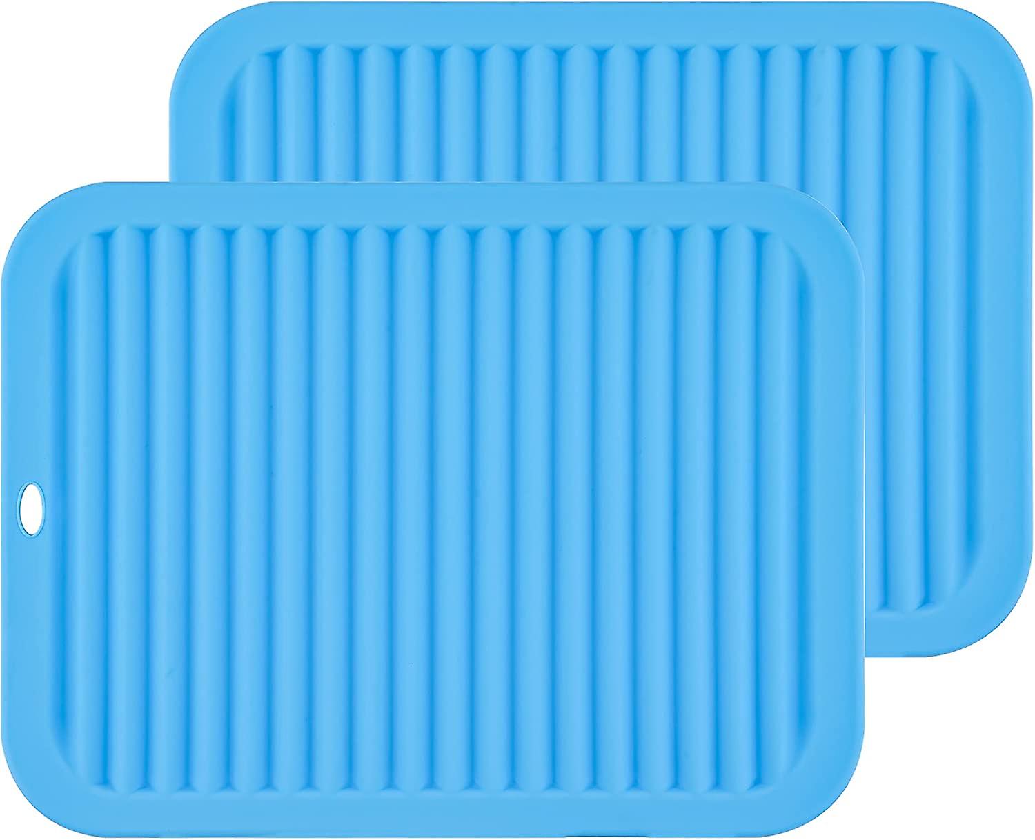 A set of 2 multi-functional silicone isolation pads, ideal for use as a tripod or drain stand