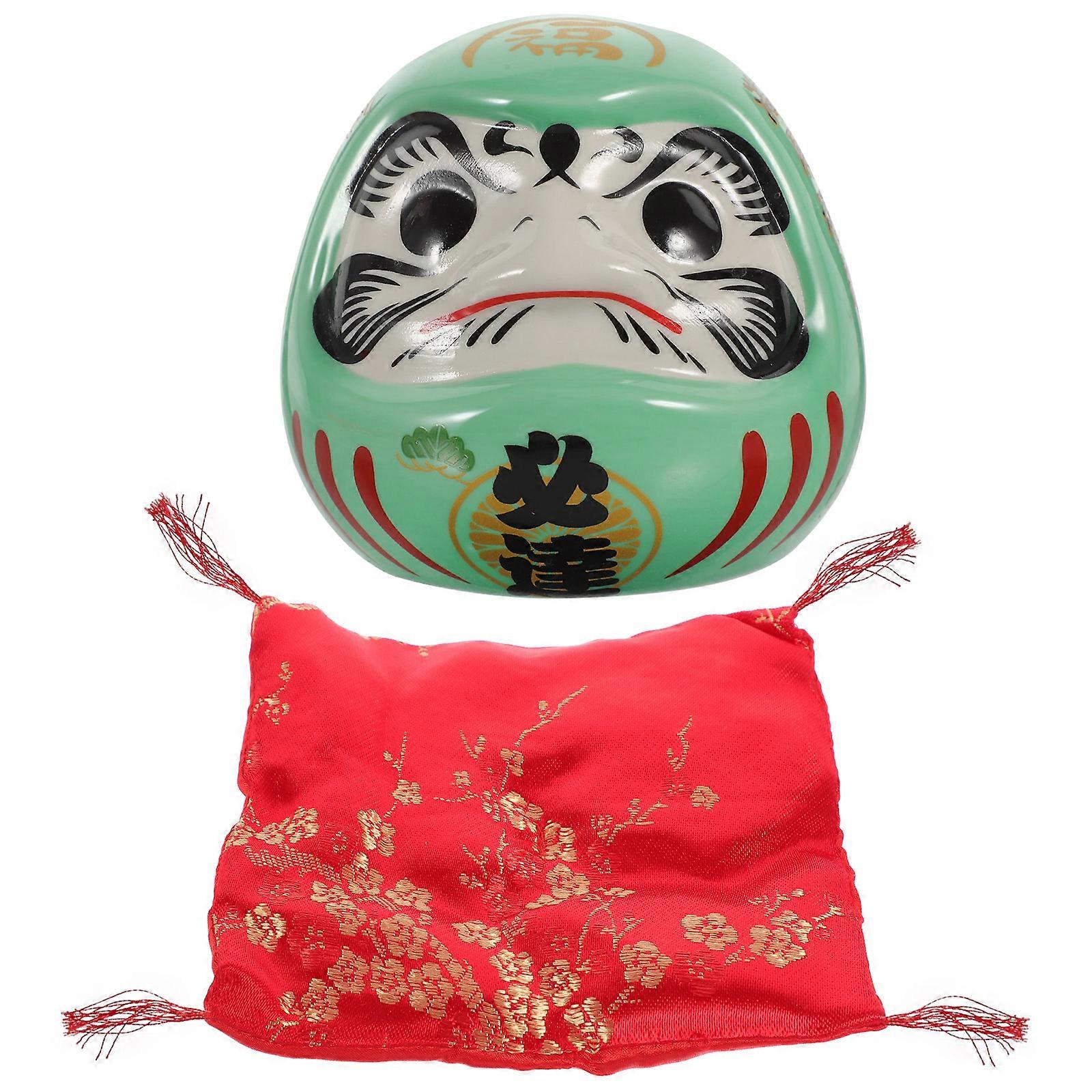 Here's a polished and professional product description based on your input:
**Japanese Dharma Piggy Bank – Green Ceramic Money Jar with Large