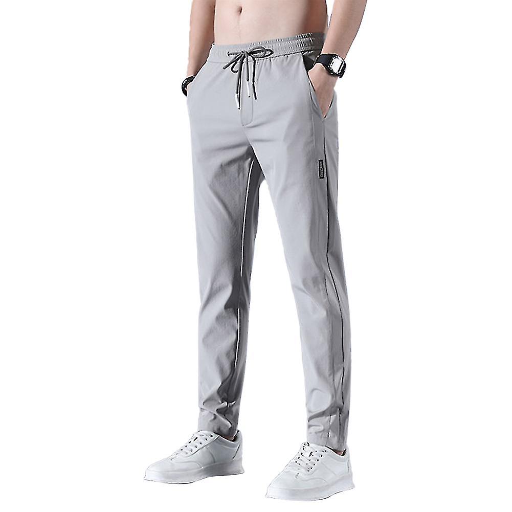 Väri Keskivyötärö Vapaa-ajan housut Löysät hengittävät housut Kiinteä M Musta Ohut nopeasti kuivuva polyesteri Miesten jääsilkki