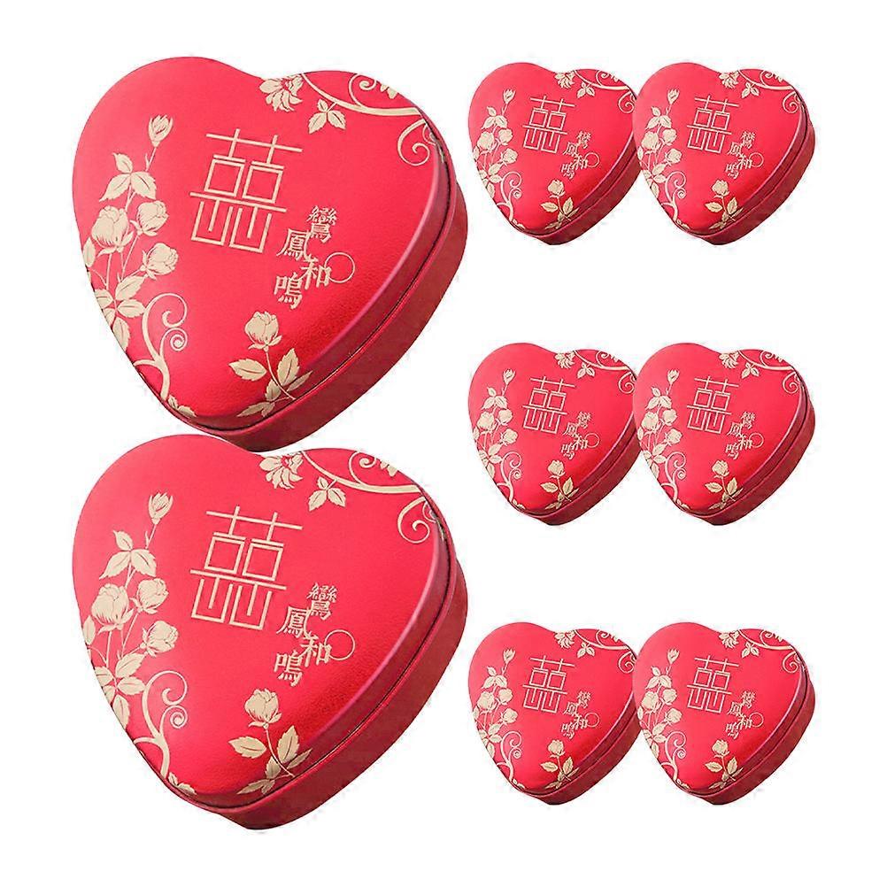 It looks like you're referring to **8 sets of wedding favor boxes**, possibly made of **tinplate**, shaped like **hearts** or other decorative