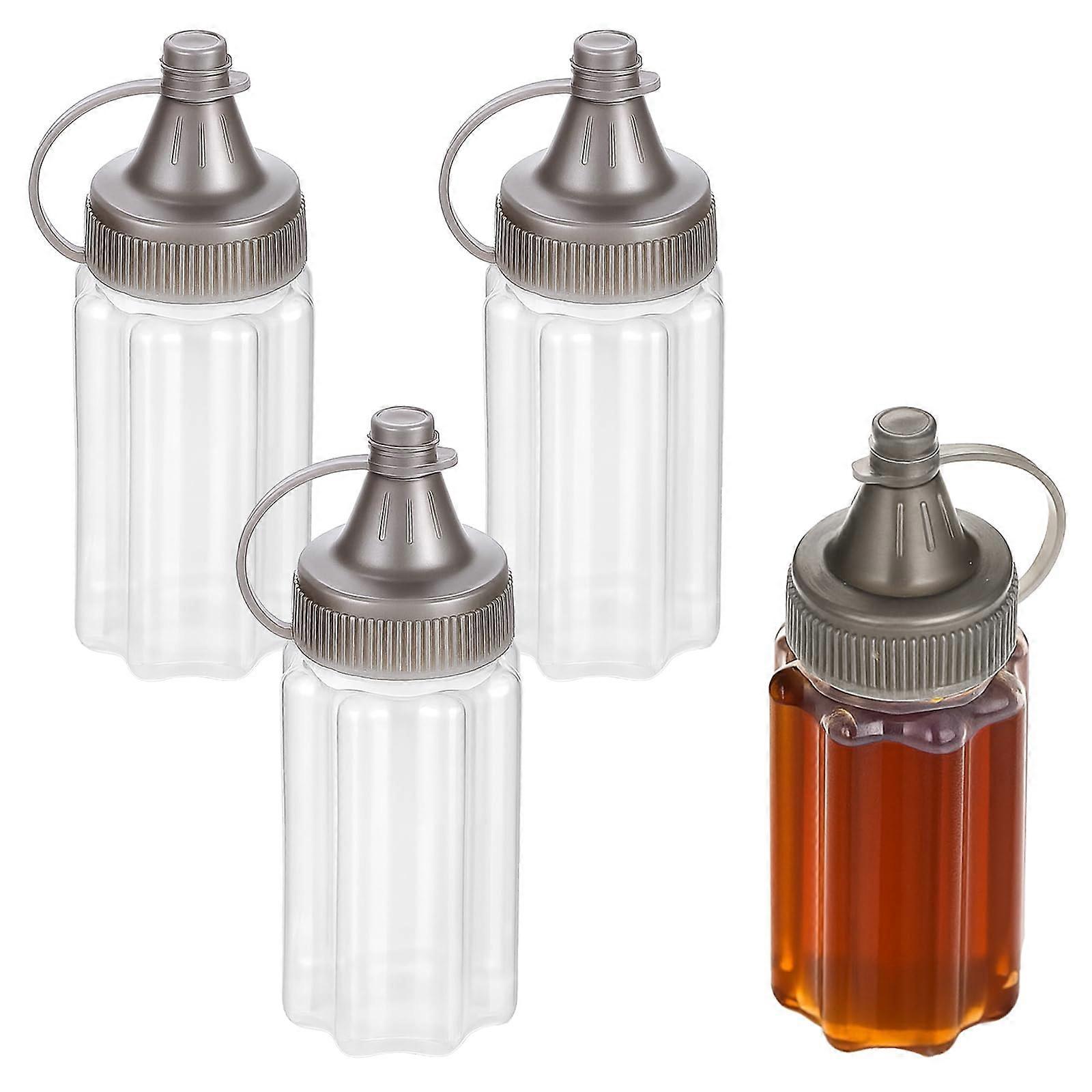 Mini Sauce Bottles Set of 4 Leakproof Snap Lid Transparent Reusable Travel Condiment Containers