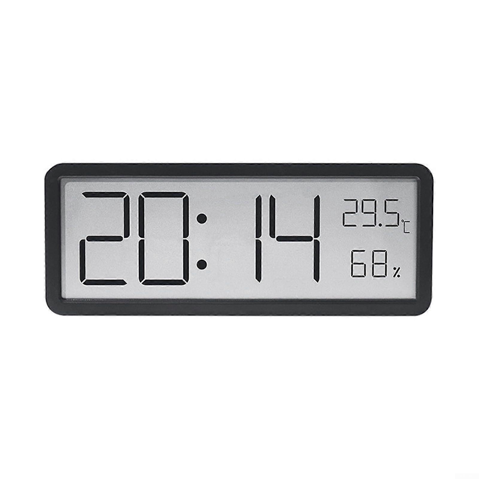 LCD display with time, date, humidity, and temperature readings, wallmounted or desktop use (black).