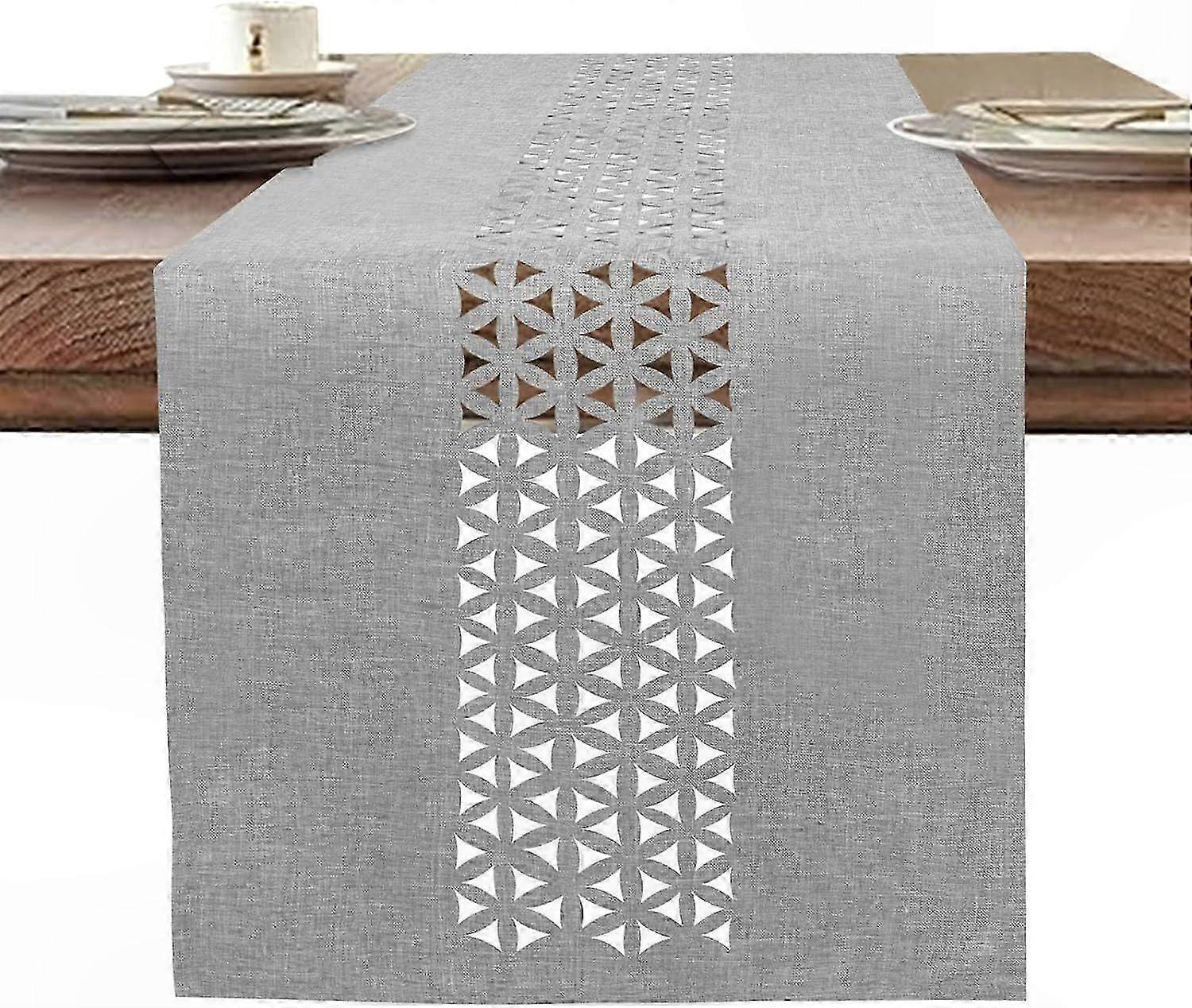 Elegant Dining Decor with Laser-Cut Patterned Table Runners and Cloths