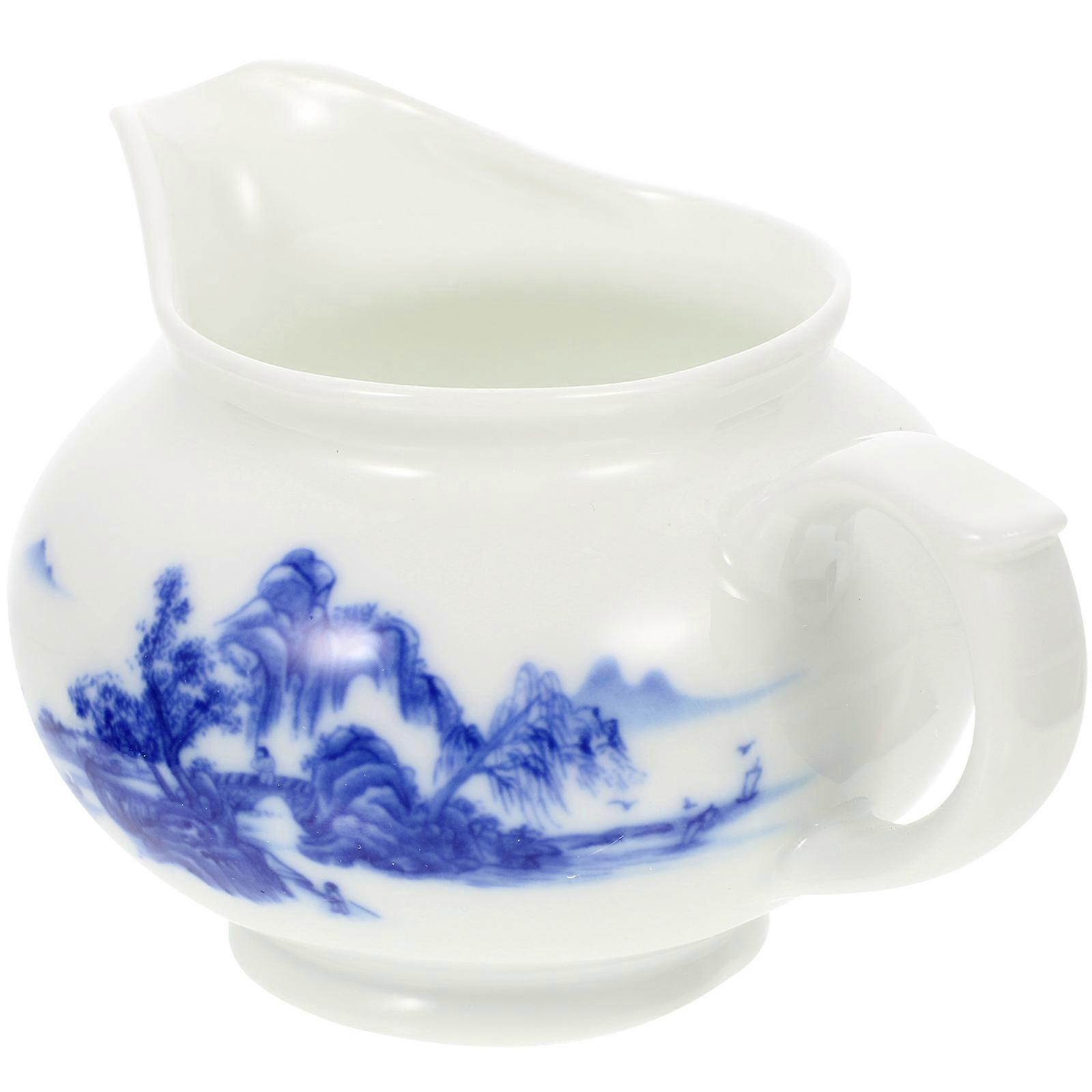 a refined and professional product description for your **Ceramic Gravy Boat**:
### **Elegant Ceramic Gravy Boat with Dripless Pour Spout – White