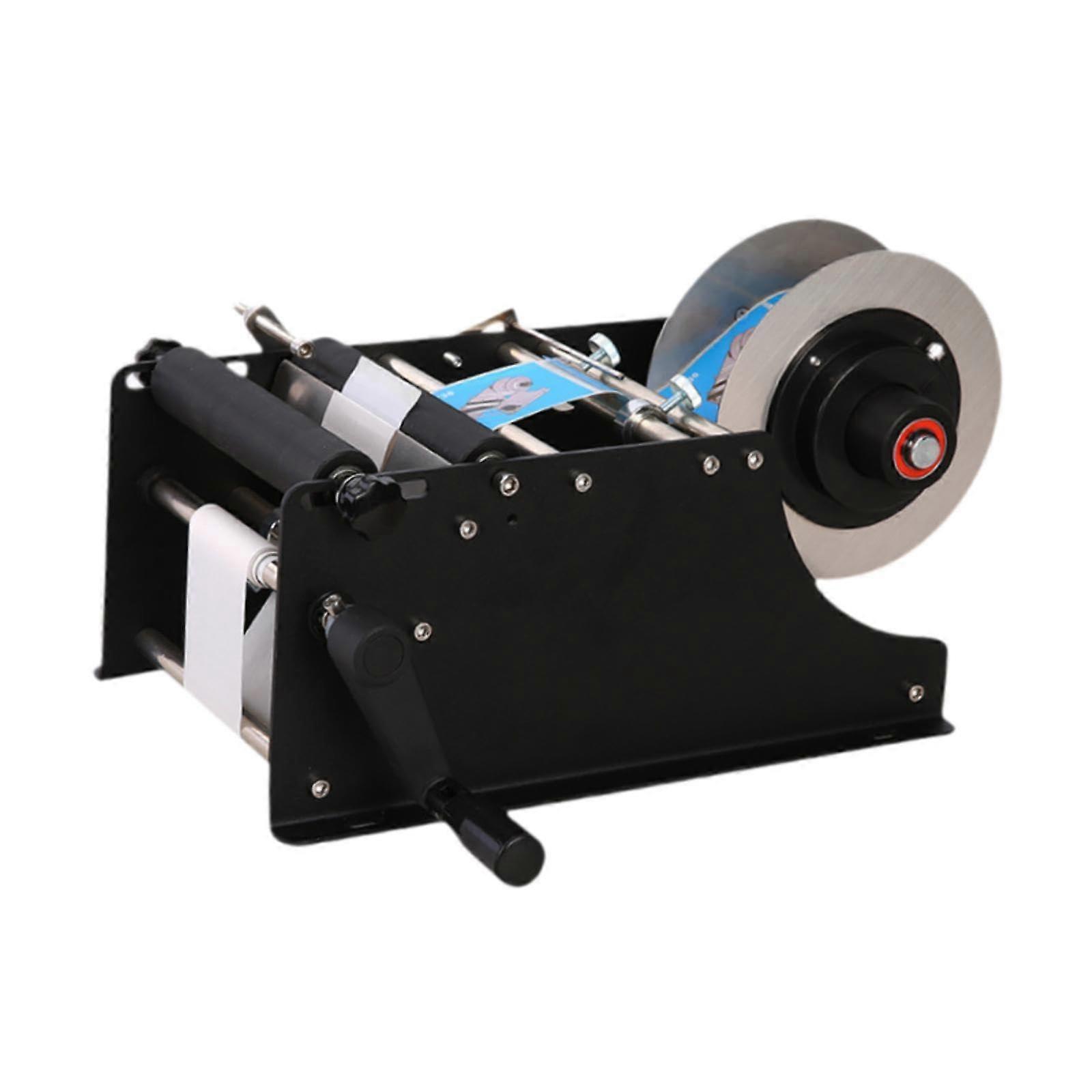 Manual bottle labeling machine, application for bottles, label dispenser 1030 pieces/min.