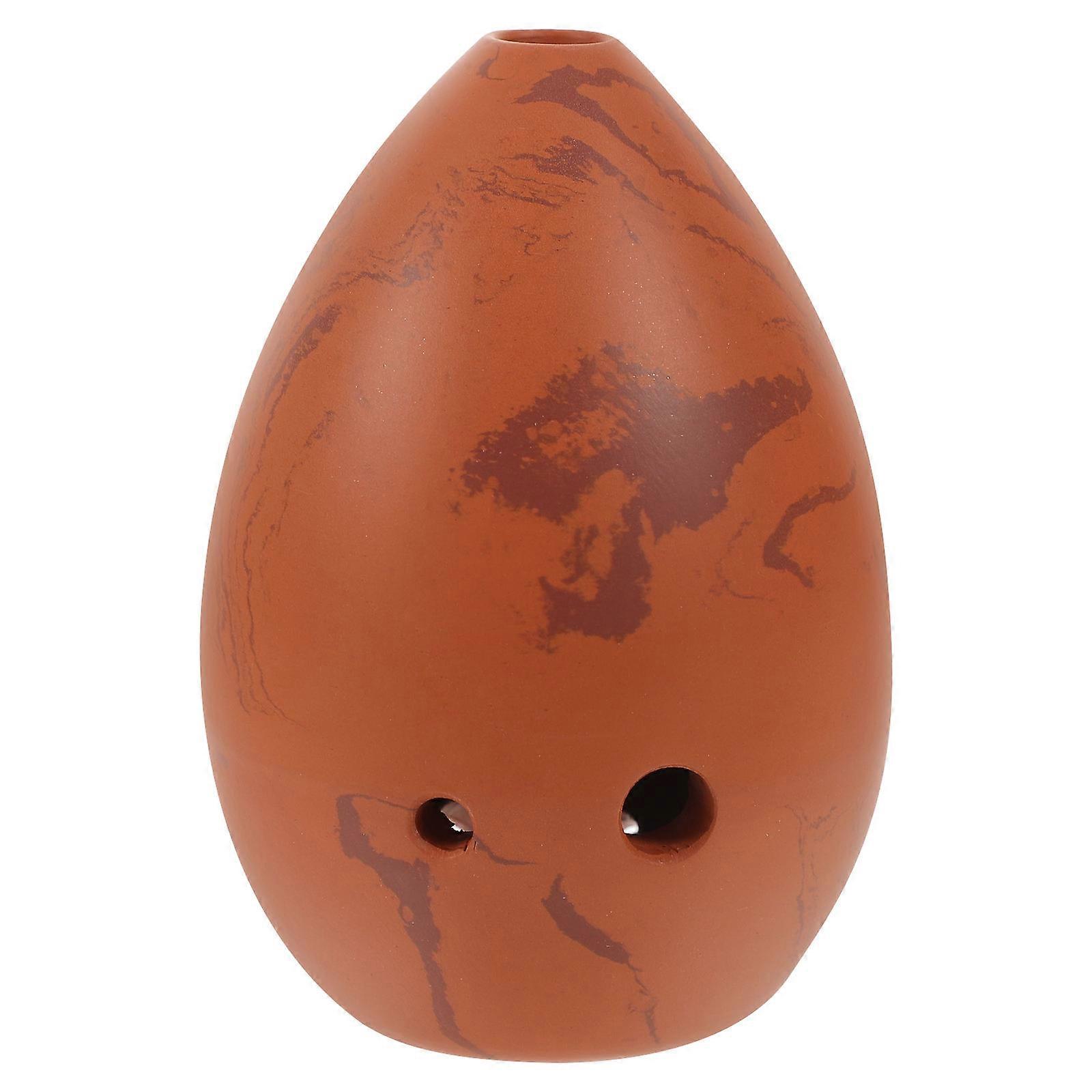 The **Portable Pear Shaped Xun** is a lightweight and beginner friendly musical instrument designed for children and novice musicians. The xun (also