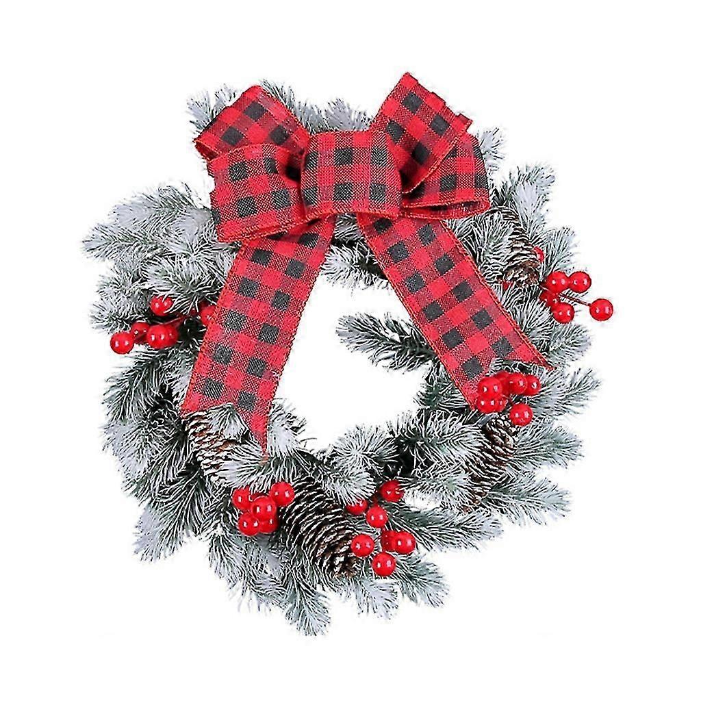 Charmante couronne de Noël avec nœud papillon, parfaite pour les portes, les murs et les fenêtres