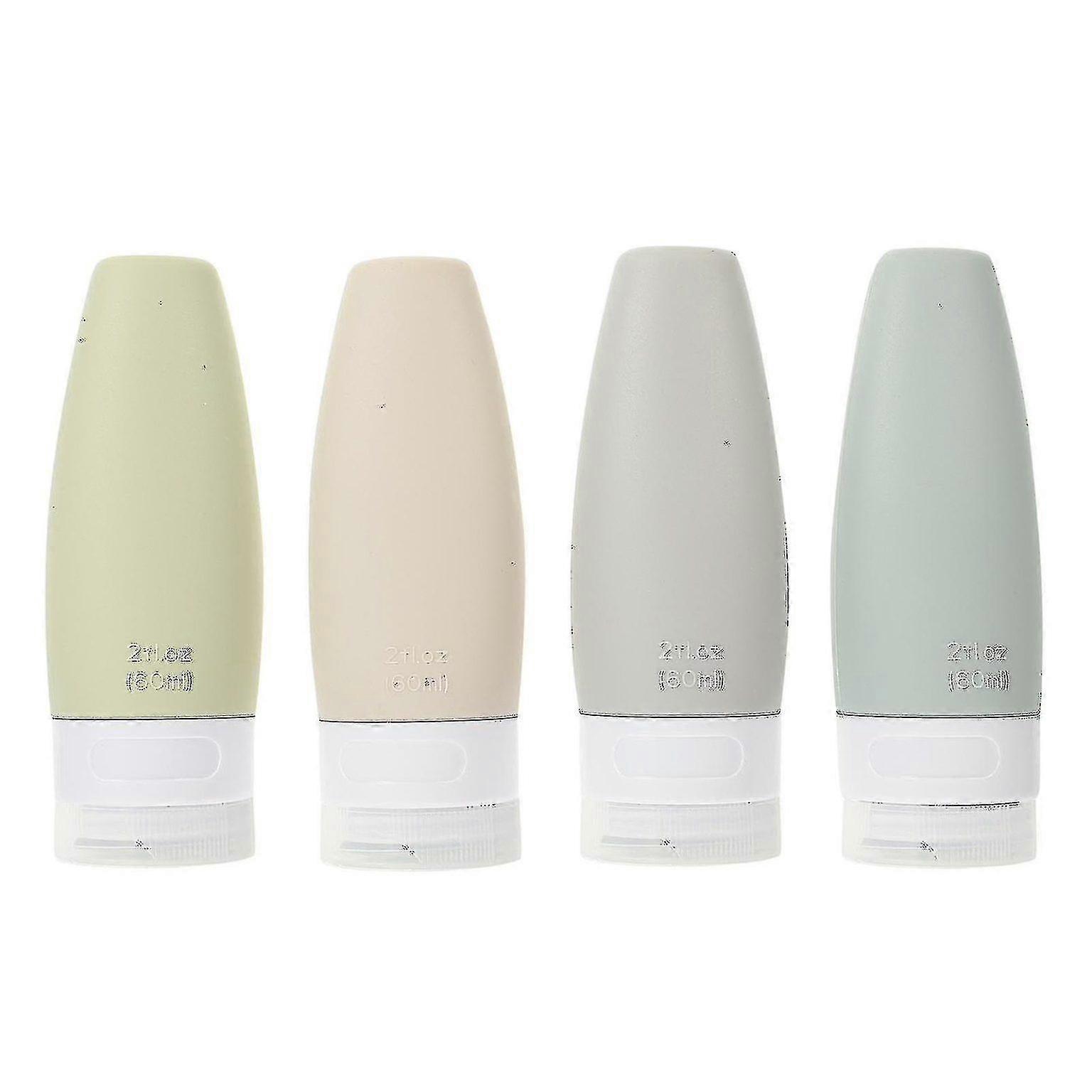 Leak-Proof Travel Shampoo Bottles - 4 Squeezable Silicone Containers with Storage Bag for Lotion & Shampoo