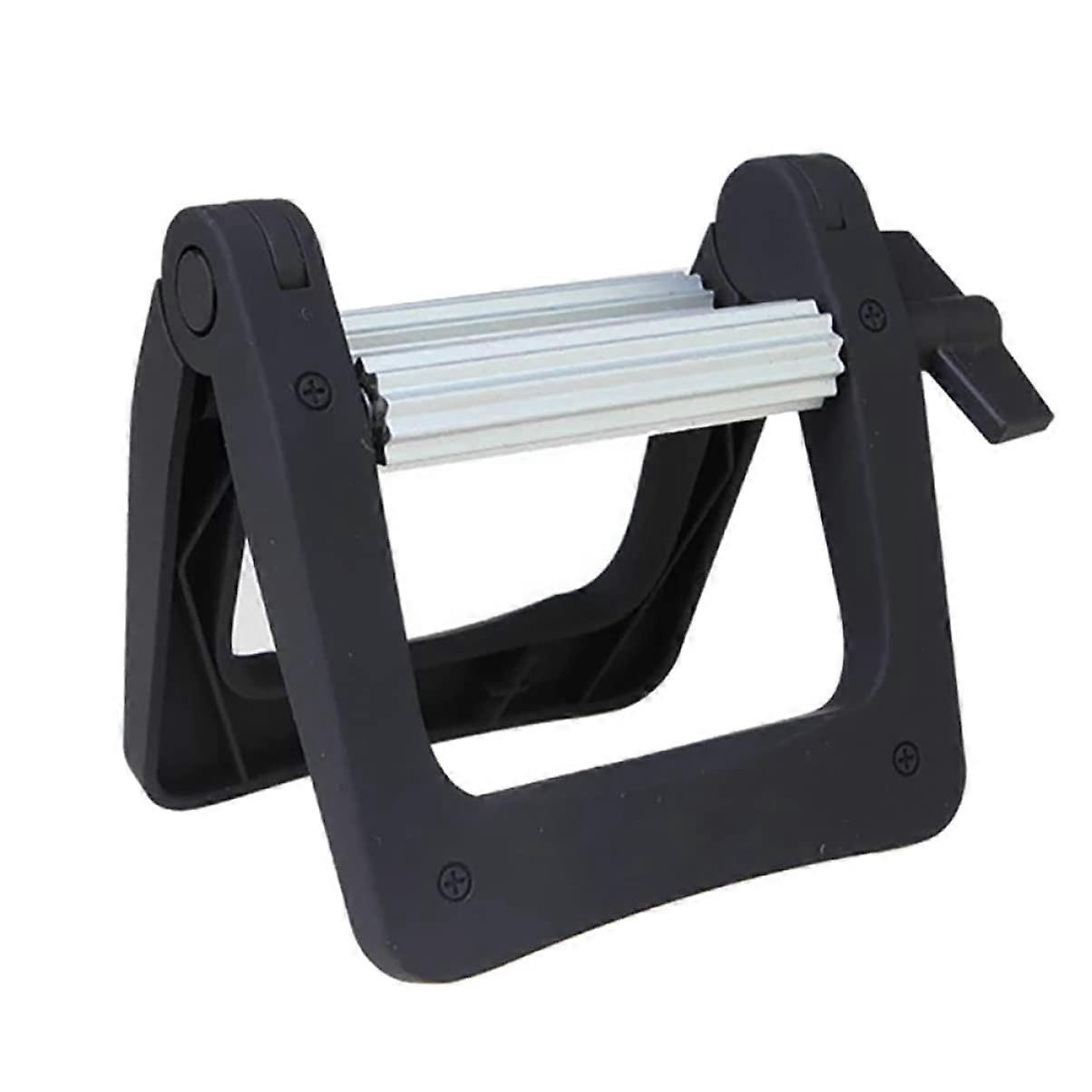 1 Tube Squeezer for Toothpaste and Creams  
Ergonomic Design  
Portable  
Easy to Use for Bathrooms and Hair Salons  
Black