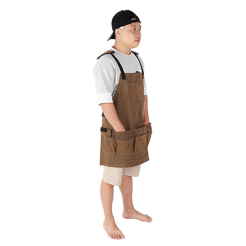 Multi-purpose waterproof carpentry apron with tool pockets for garden workshop