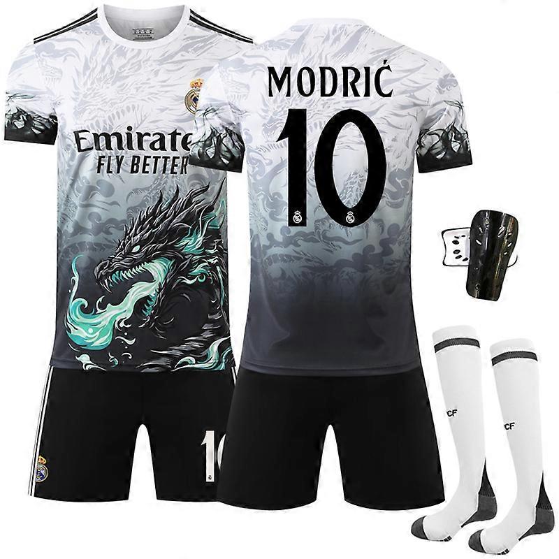 Tenue de football pour enfant/adulte de 24-25 ans : maillot taille 10 avec chaussettes et équipement de protection.