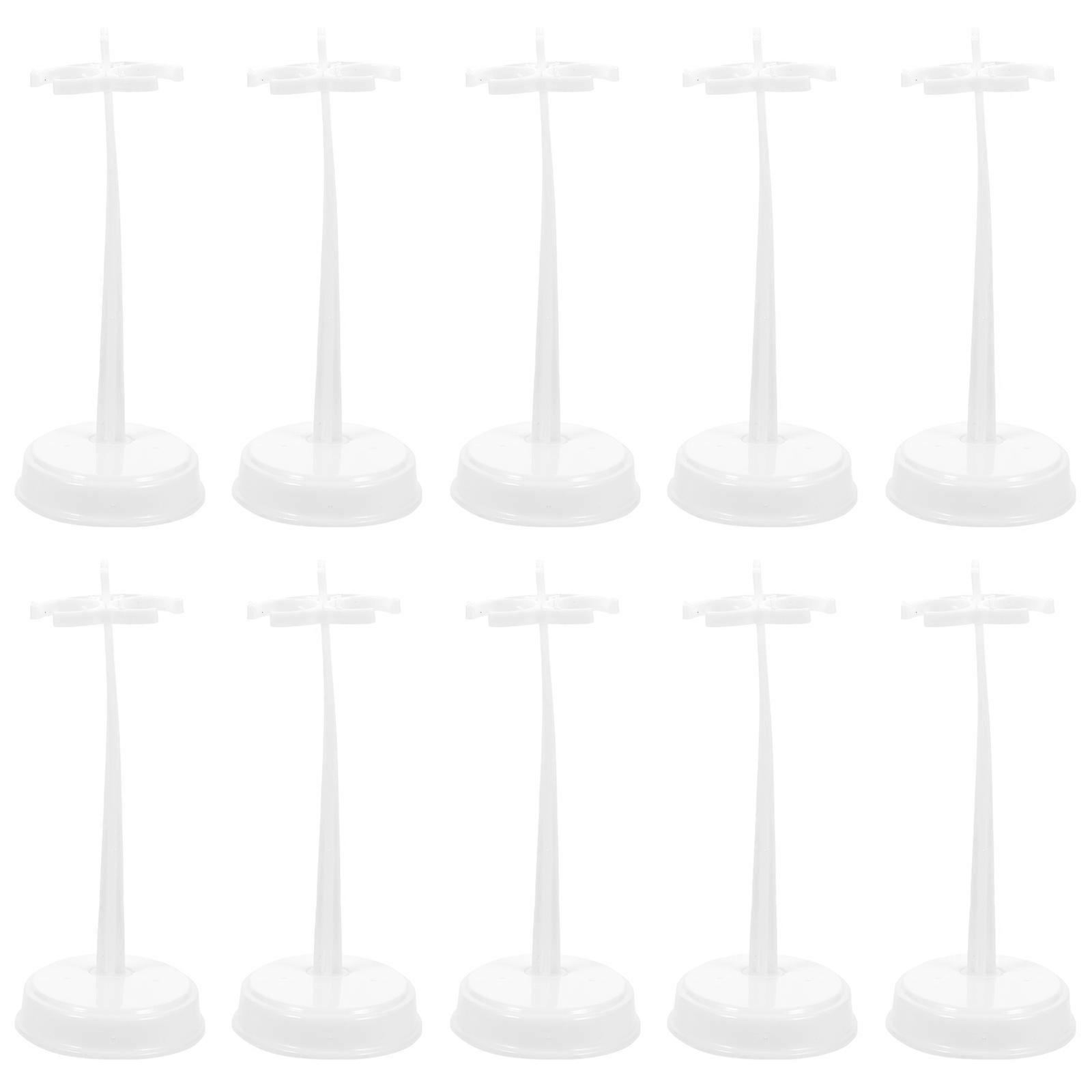 Here's a polished and professional product description for your **10pcs Mini Doll Display Stands**:
### π 10pcs Mini Doll Display Stands β White