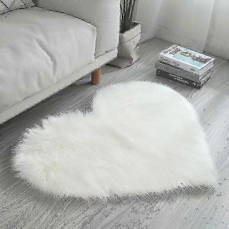 Fluffy hjerteformet teppe for soverommet