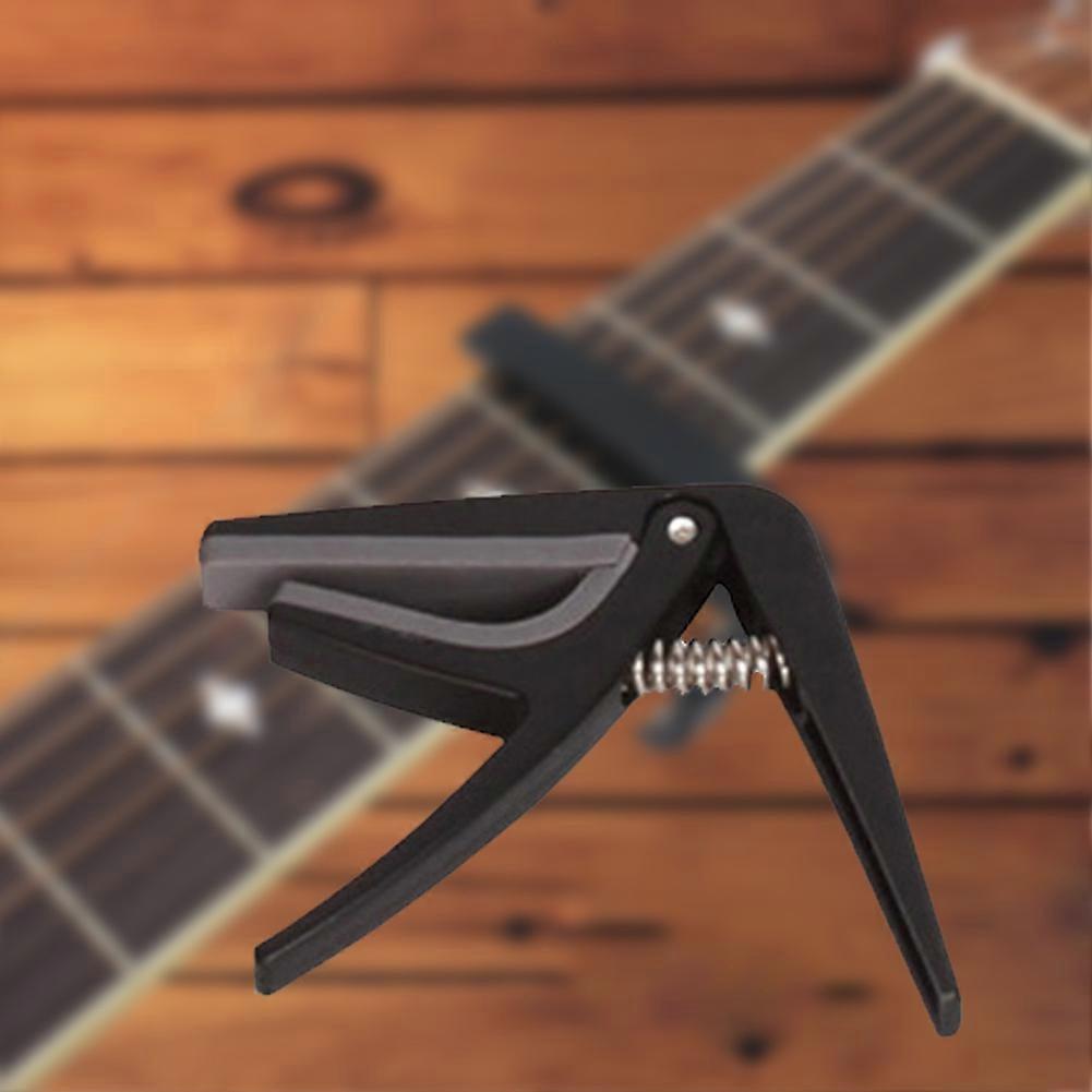 4 in 1 Ukulele Accessory Set with Capo, Strap, Strings & Shaker