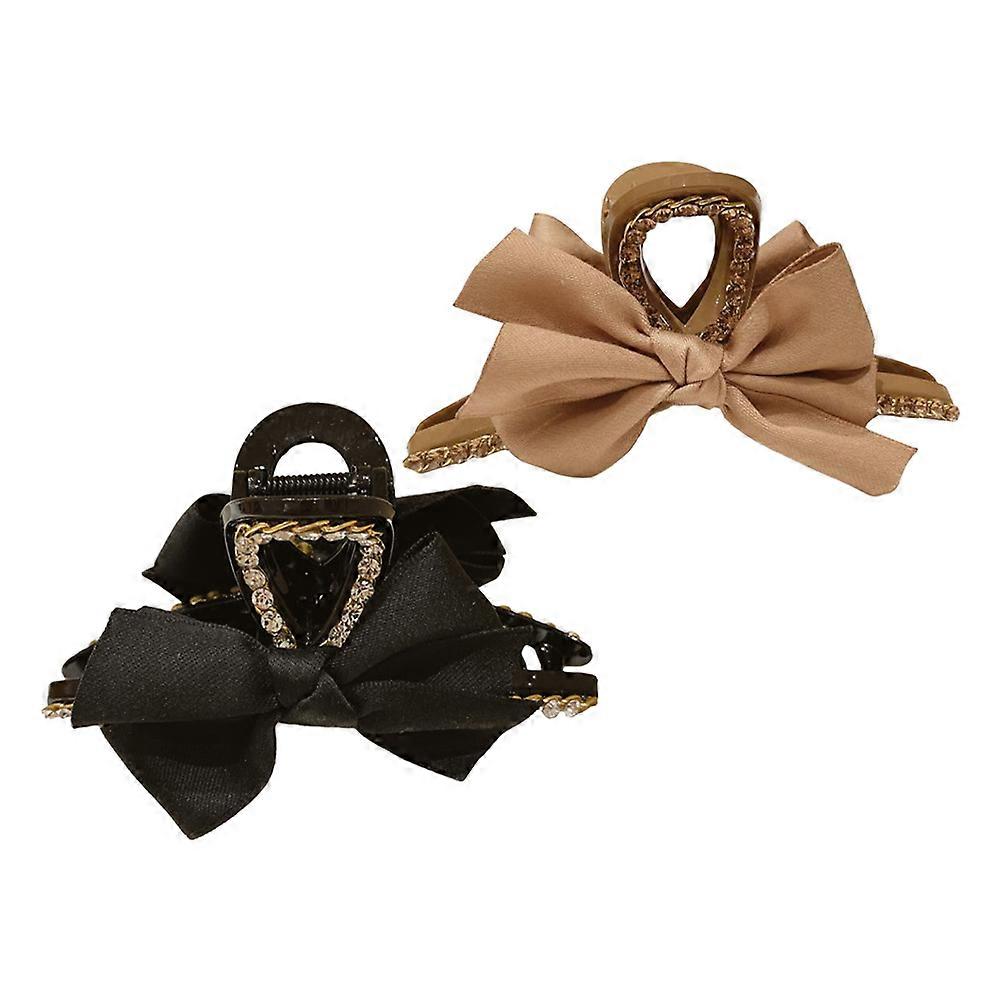 Here's a refined and professional product description for the item you mentioned:
**2PCS Women's Bowknot Hair Clamp – Comfortable & Stylish Hair