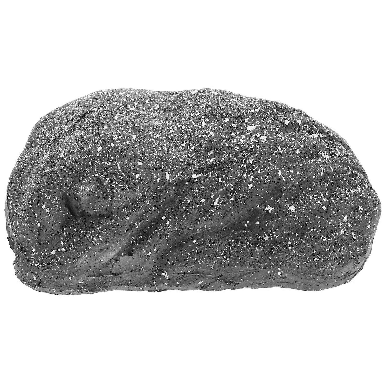 It sounds like you're describing a **fake stone key hider** made from **resin** that looks like a , designed for **outdoor use** in gardens or near