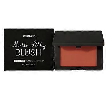O blush matte vermelho-alaranjado é portátil e de longa duração, ideal para uso diário. Proporciona um efeito de maquiagem leve, natural e delicado, que se adapta perfeitamente à pele.