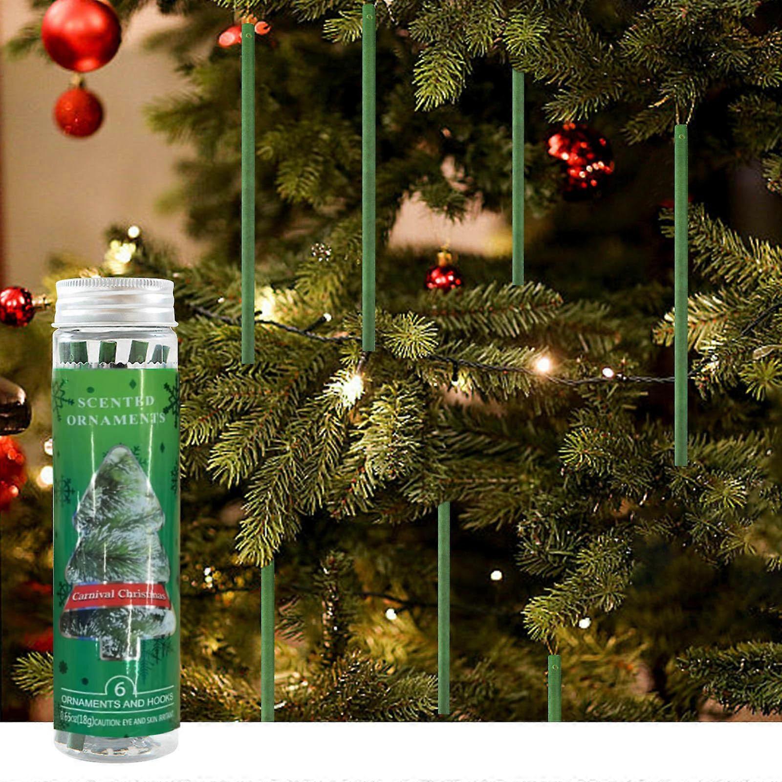 En flaska julpinnar. Nya julgransdekorationer arompinnar