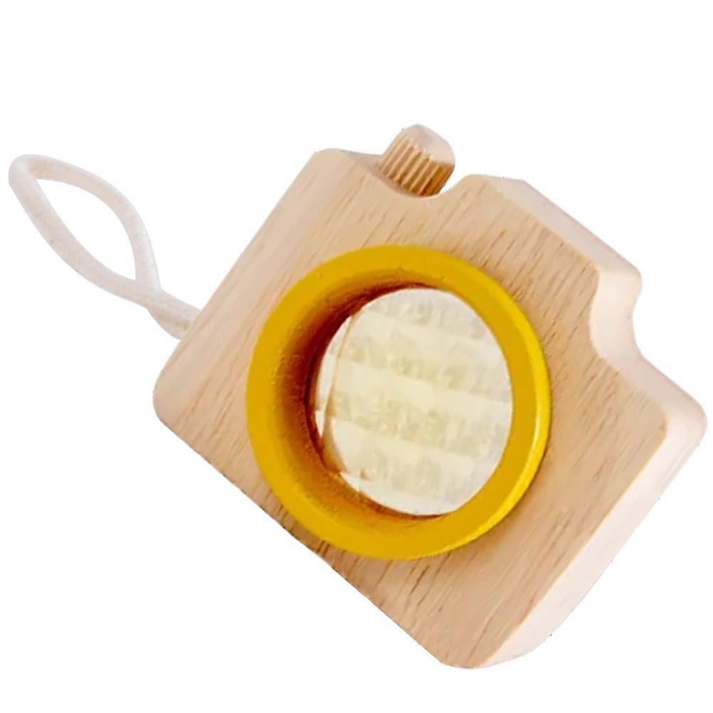 Caleidoscópio criativo para crianças, feito com madeira e vidro.