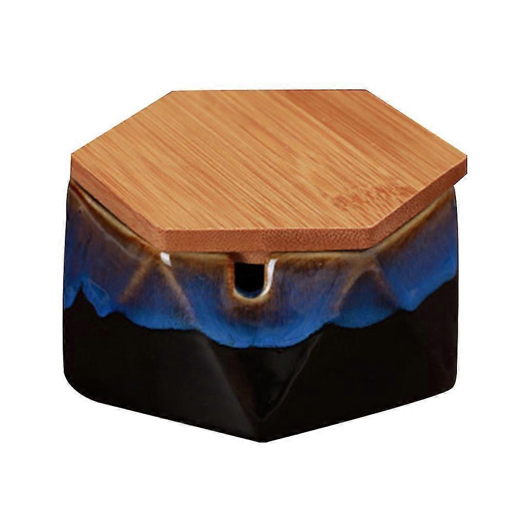 Keramisk askebeger med lokk