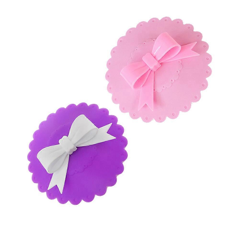 Tampas de silicone com laço para canecas, para proteção contra o calor, 2 unidades, cores sortidas.