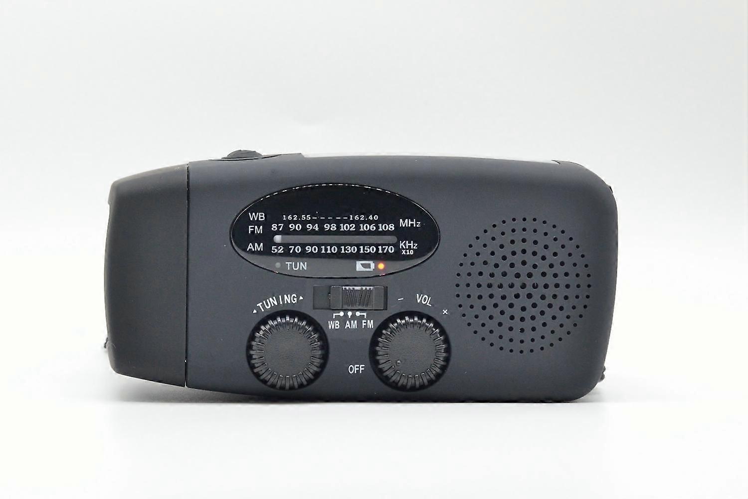 solar hand crank radio with LED flashlight and phone charger