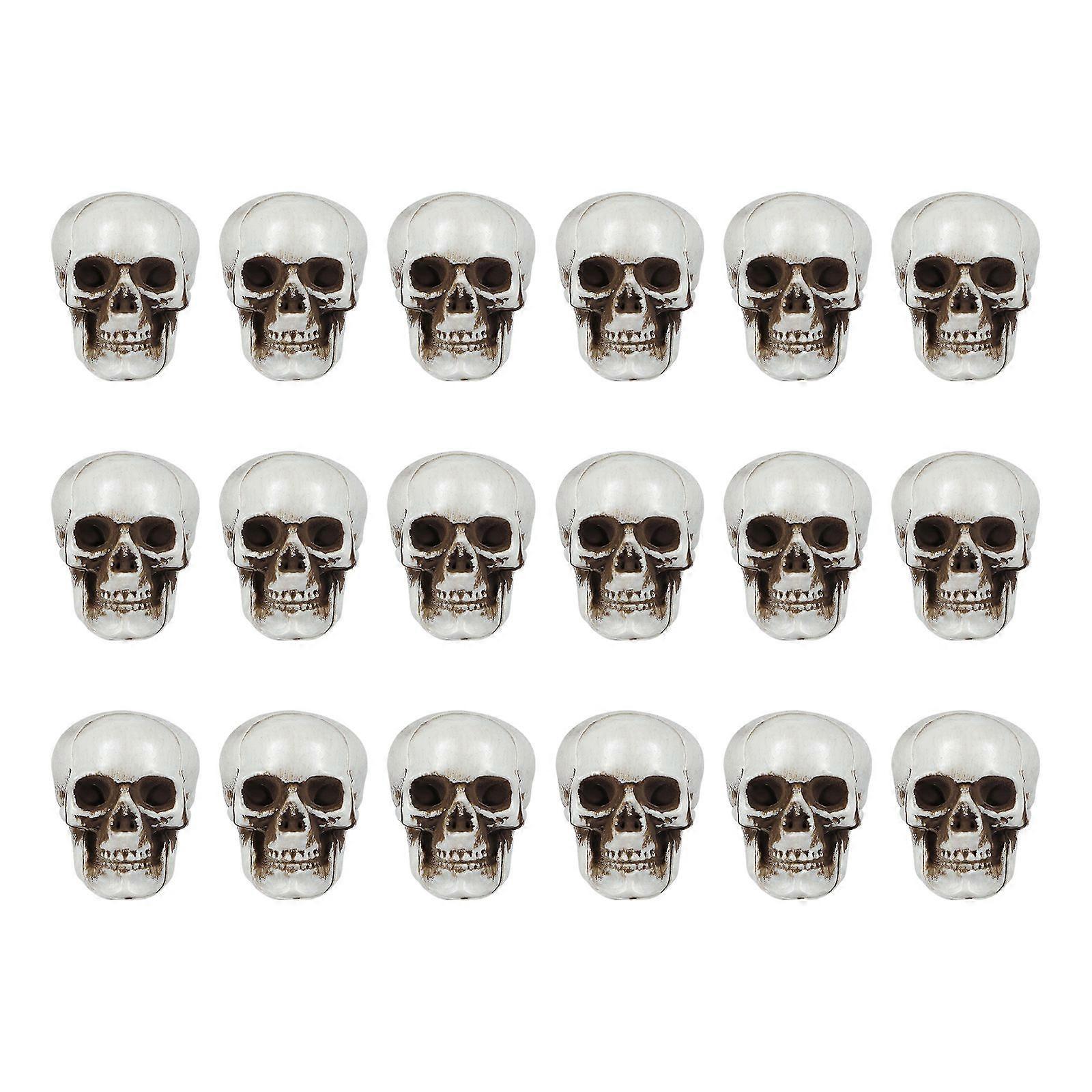 Compact Skull Decor for Festive Use, Robust Plastic Props for Themed Gatherings