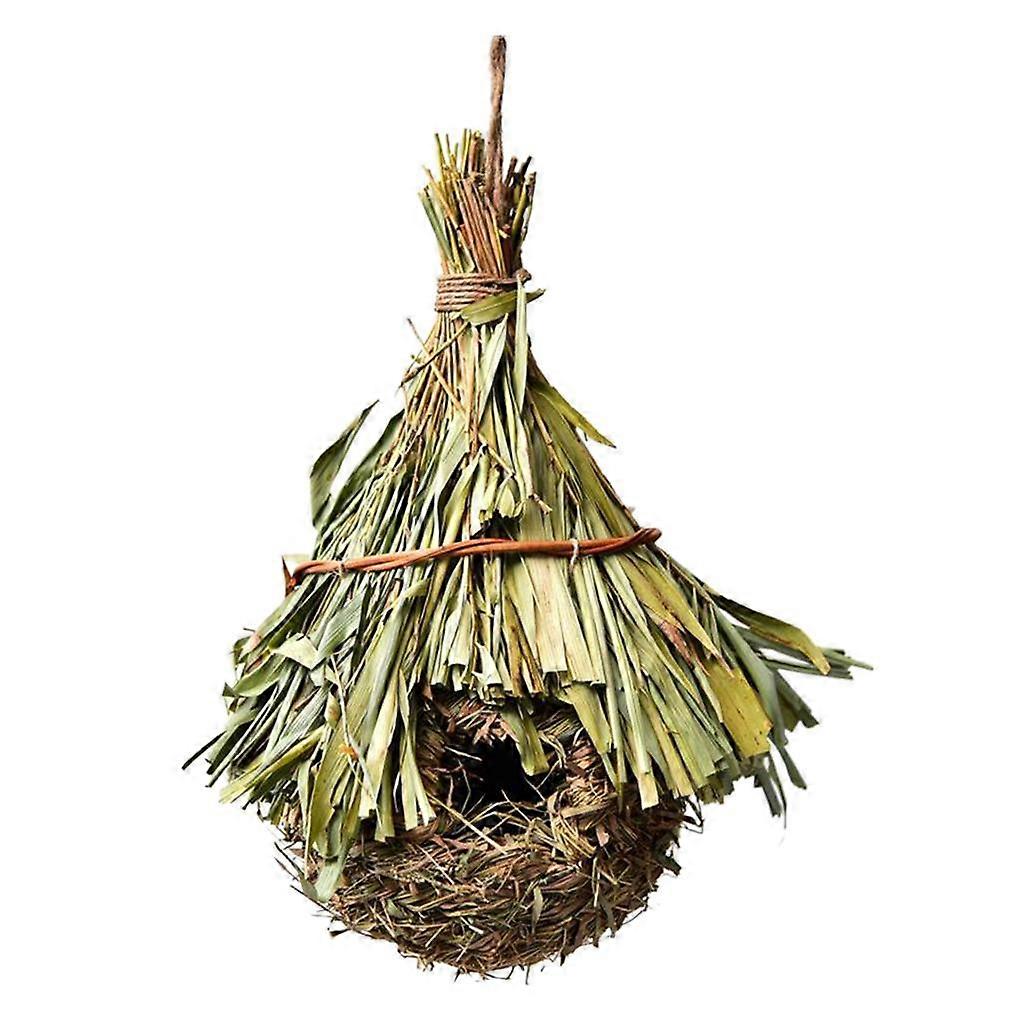 ハチドリの巣作りの家、鳥の手織りの巣のぶら下がっている巣箱の外の草