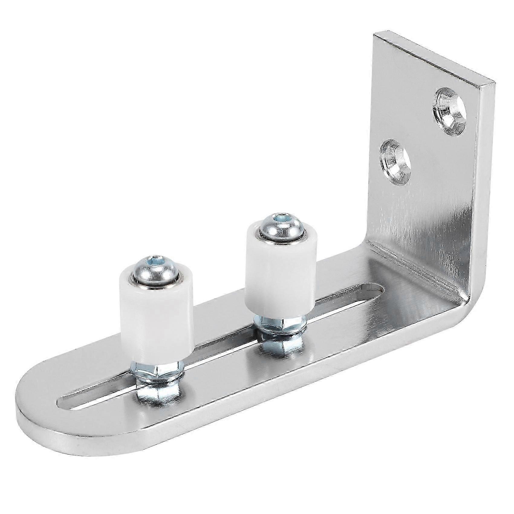 Sliding barn door guide for bottom mount adjustable stay roller