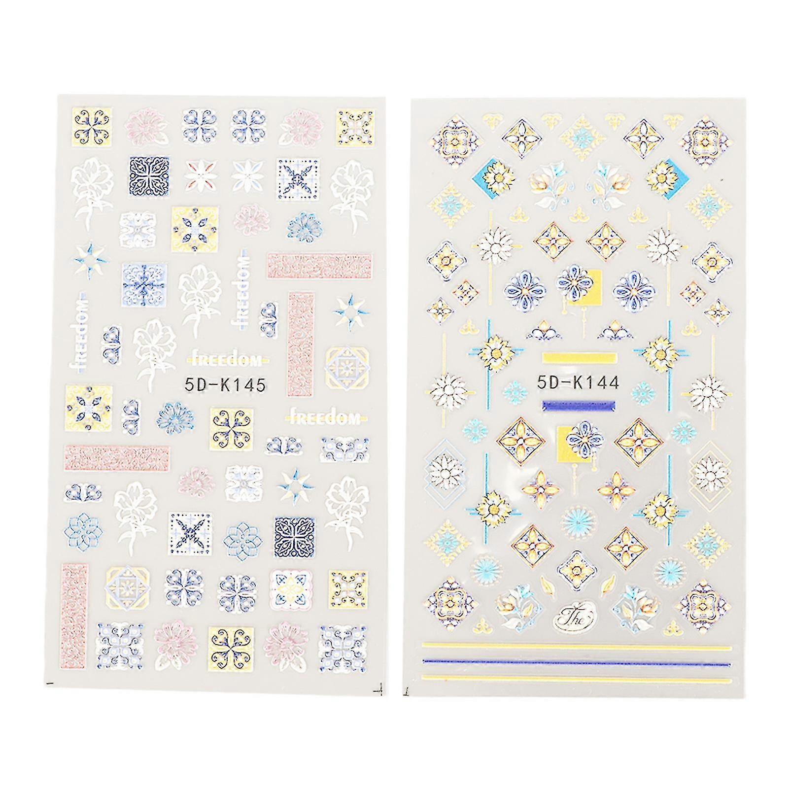 Autocollant d’art d’ongle auto-adhésif 5D - 2 feuilles | Décalcomanies d’ongles à motif creux en relief pour la décoration