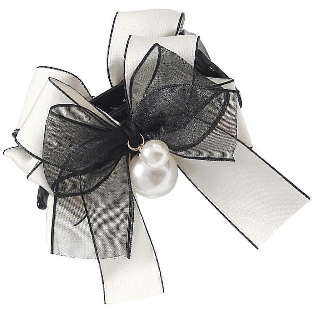 The **Elegant Bow Hair Claw Clip with Pearl Accent** is a versatile and stylish hair accessory designed for women who appreciate both functionality