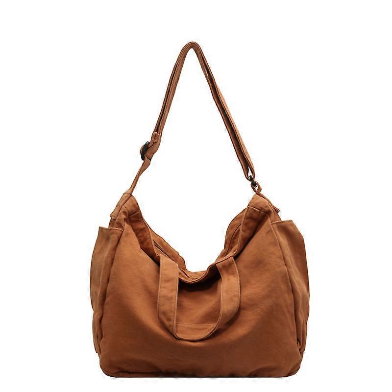 Axelväska i canvas med axelrem