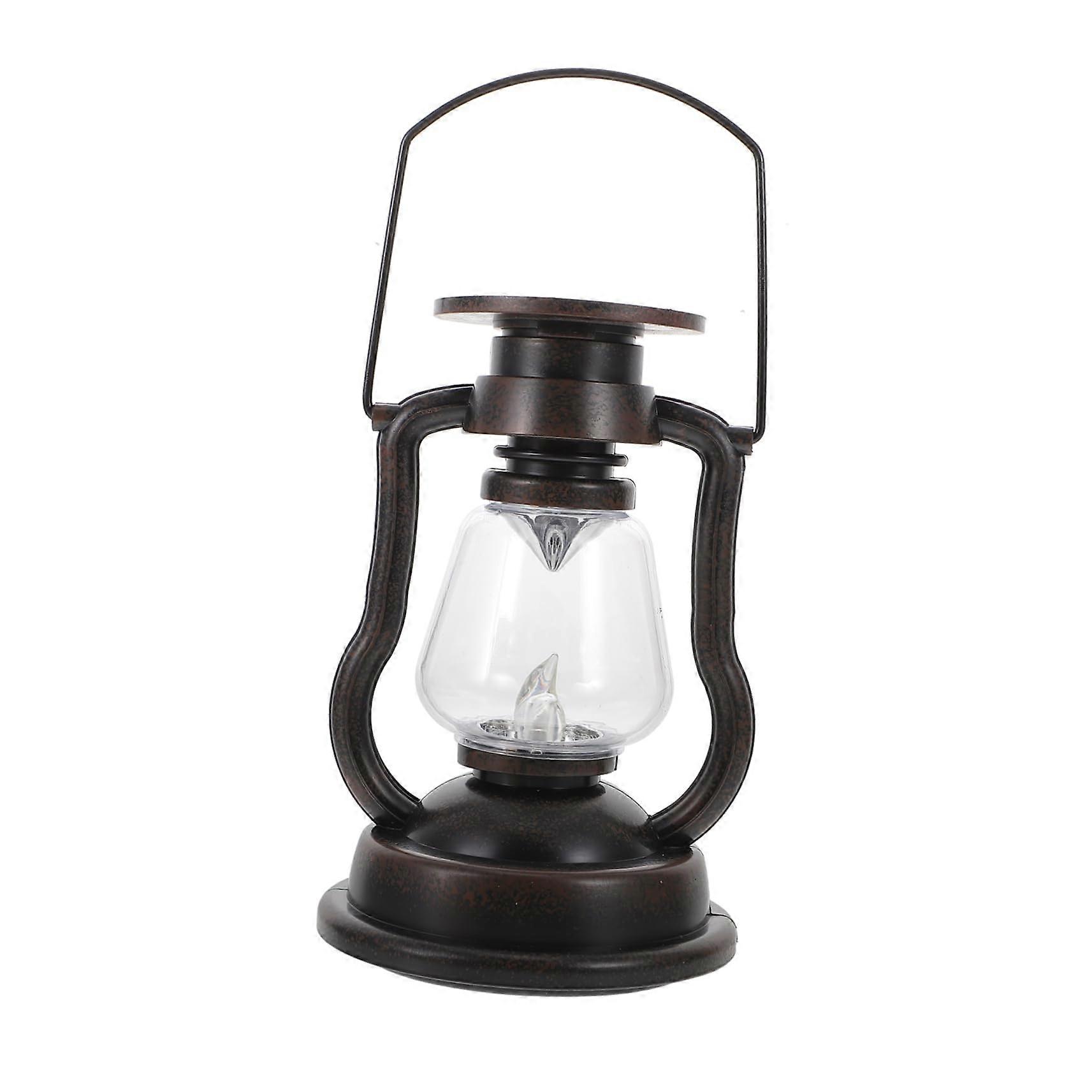 Solar lantern with flickering flame vintage LED wind light for garden, terrace, and camping, weatherproof portable for BBQ and parties.