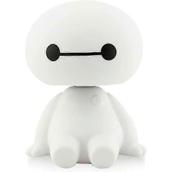 Cute Baymax doll shaking its head with base and 360 degree rotating head for car decor.