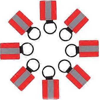 Etiquetas refletoras dupla face para chaveiros, para maior visibilidade. Pacote com 10 unidades. Etiquetas vermelhas para mochilas.