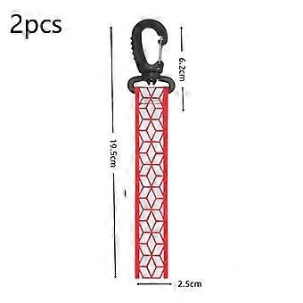 2 correas de seguridad reflectantes de alta visibilidad con resistentes mosquetones, perfectas para senderismo, ciclismo y uso en mochilas.