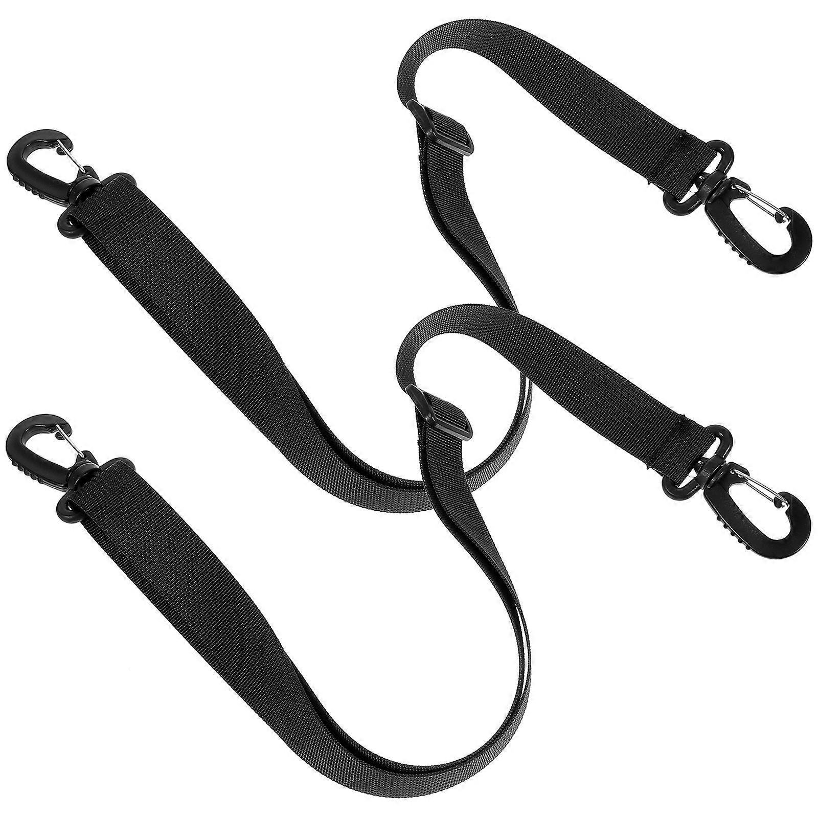 Sangle de transport noire pour chaussures de ski, idéale pour une utilisation en extérieur, avec 2 bandoulières réglables.