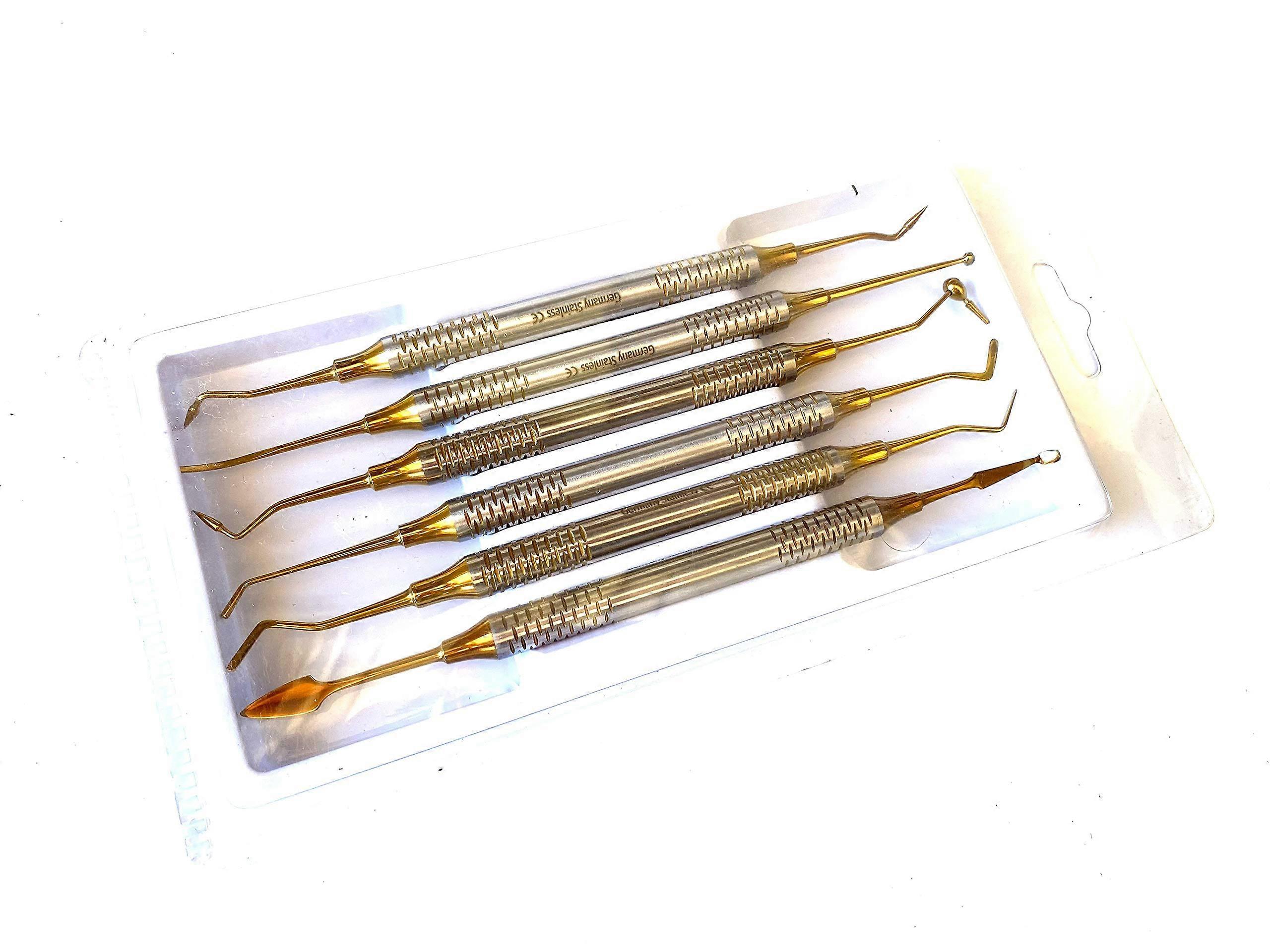 6 قطع أداة تعبئة الأسنان المركبة ترميم الذهب التيتانيوم المغلفة