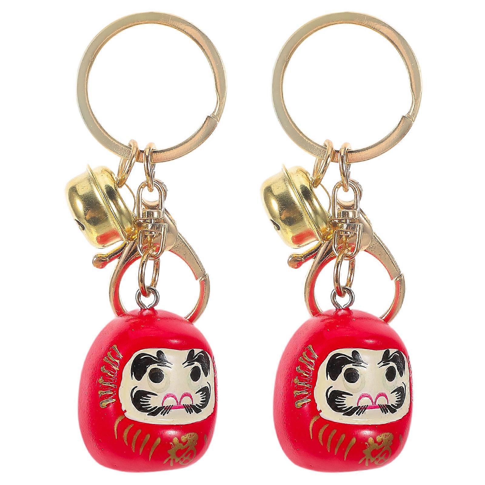 Here's a refined and engaging product description for your **Japanese Daruma Keychain**:

 

**2pcs Japanese Daruma Keychain – Resilient Luck Charm