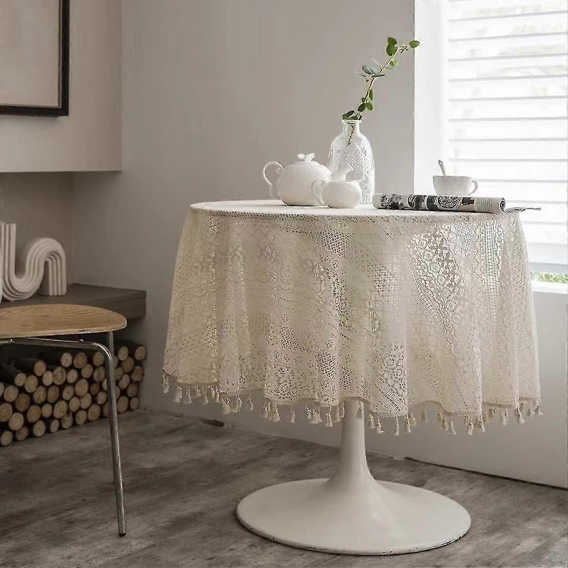 Rund vanlig beige spetsduk med fransutskärningar