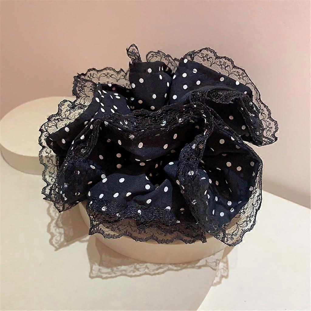 Black Fabric Scrunchie with EyeCatching Folded Design for Ponytail and Bun Styling