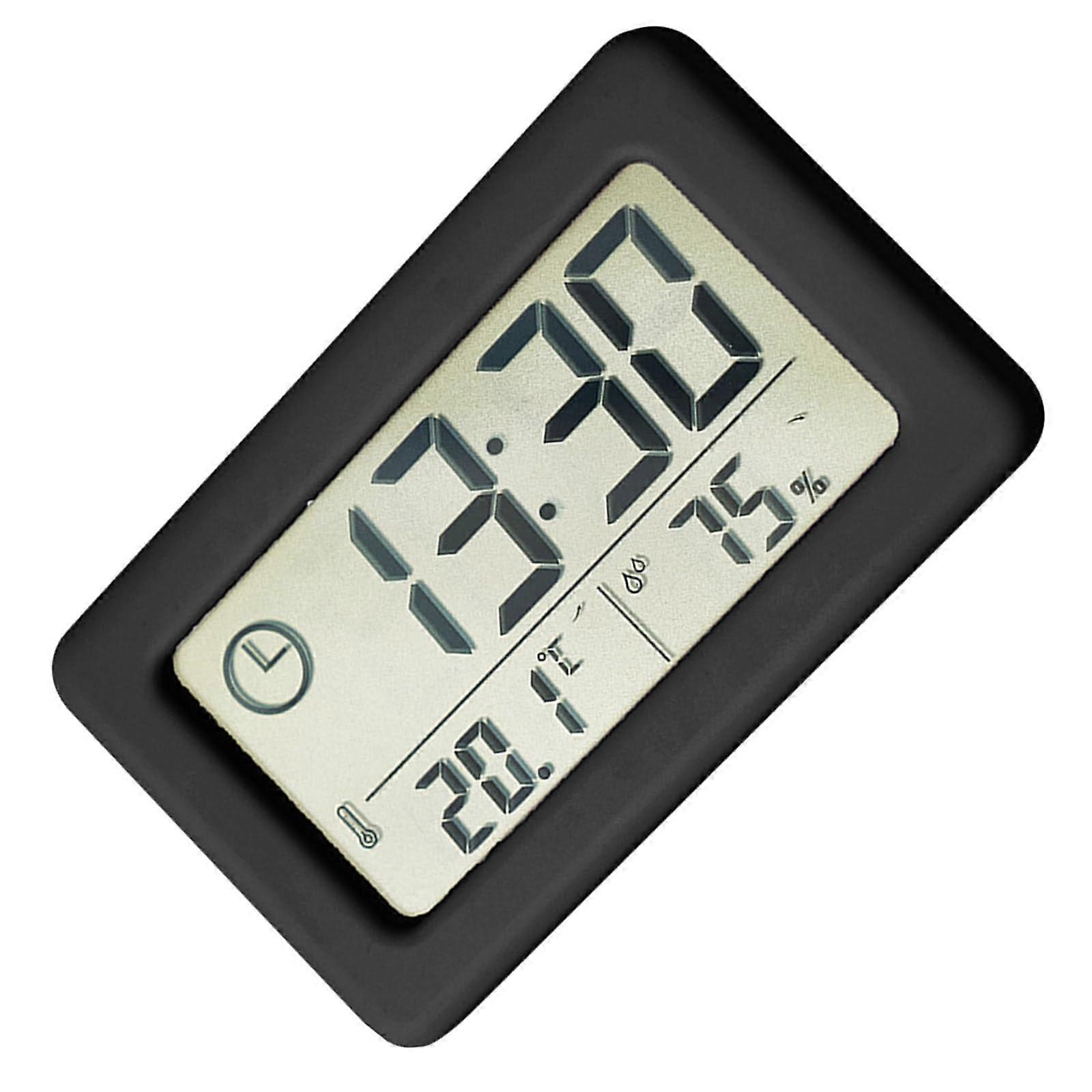 Batterypowered clock with builtin thermometer and hygrometer for home or office, black.
