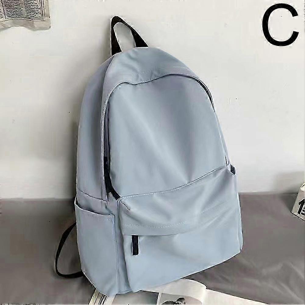 Ergonomic and Durable Student Backpack with Solid Color and Large Storage Capacity