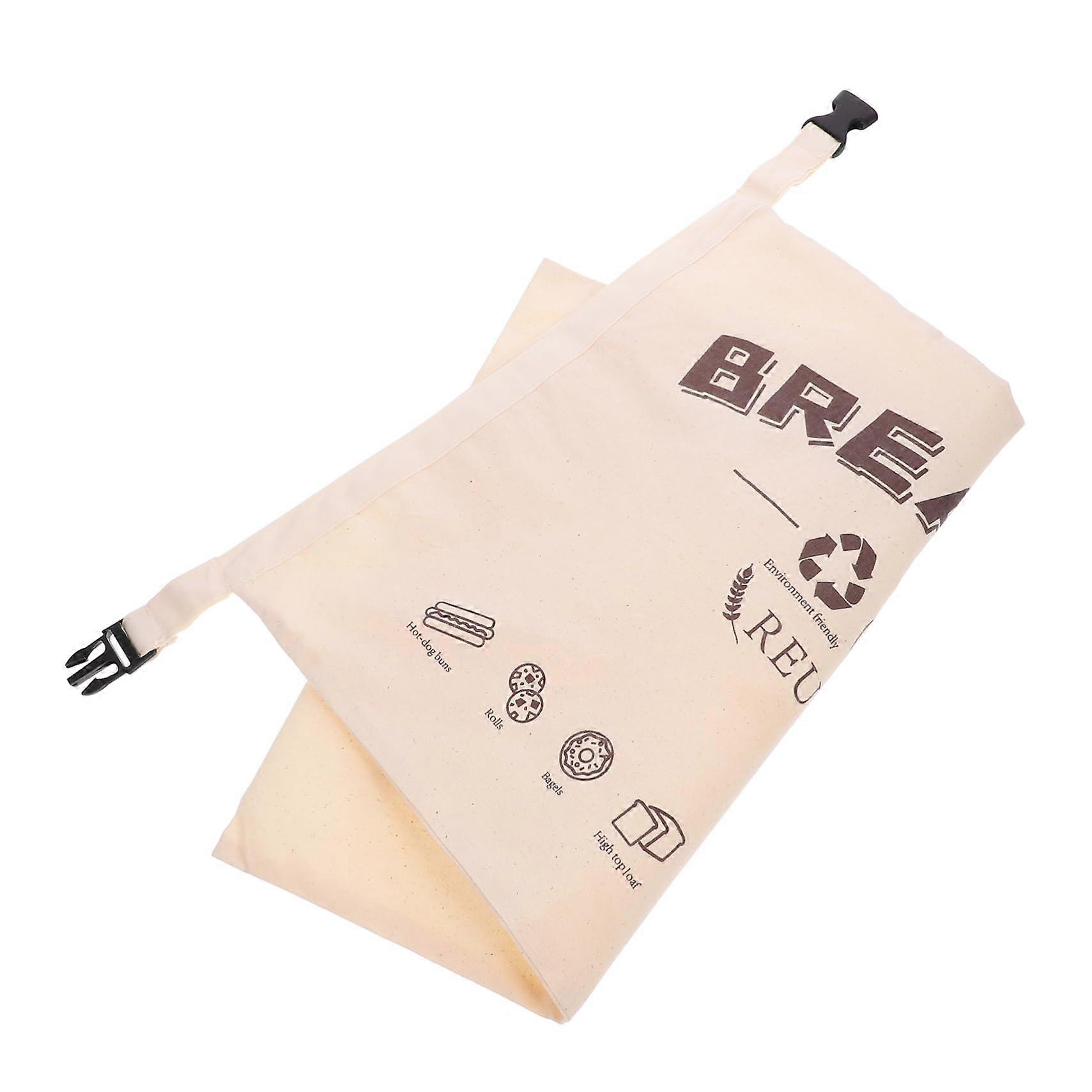 Reusable cotton bread bag with snap closure for storing bread and baked goods, lightweight and portable for bakery or home use.