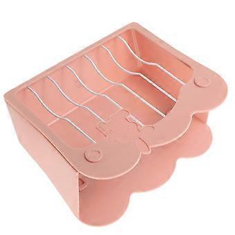 Konijnenvoerbak van plastic voor het bewaren van hooi.