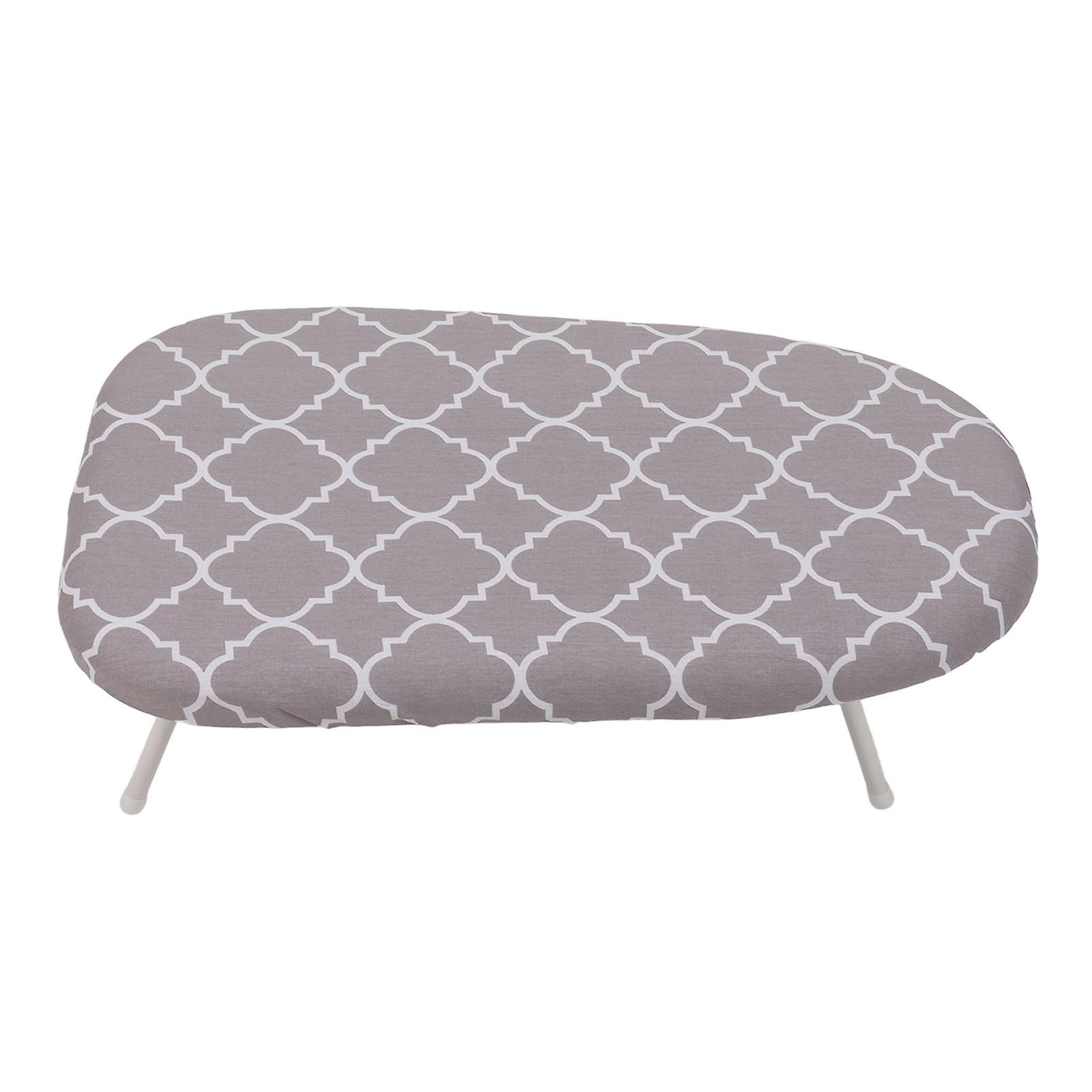 Travel ironing board with folding legs and cotton cover